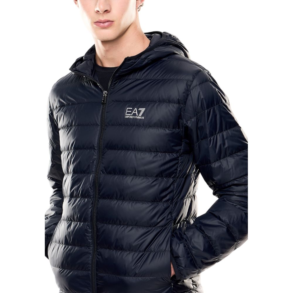 EA7 Emporio Armani blue polyamide shell jacket displayed on a hanger, showing its sleek design and lightweight fabric.