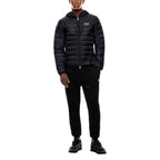 EA7 Emporio Armani bicolor polyamide full-length jacket displayed on a hanger, showcasing its sleek design and contrasting colors.