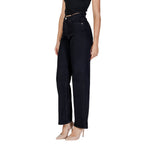 Vero Moda black cotton mom jeans displayed on a hanger, showcasing high-waisted, relaxed fit denim with classic five-pocket design.