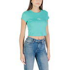 Calvin Klein Jeans turquoise cotton T-shirt with crew neck and short sleeves, casual everyday style perfect for casual wear.