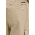 Calvin Klein Jeans beige cotton cargo pants with multiple pockets and relaxed fit, displayed on a neutral background.