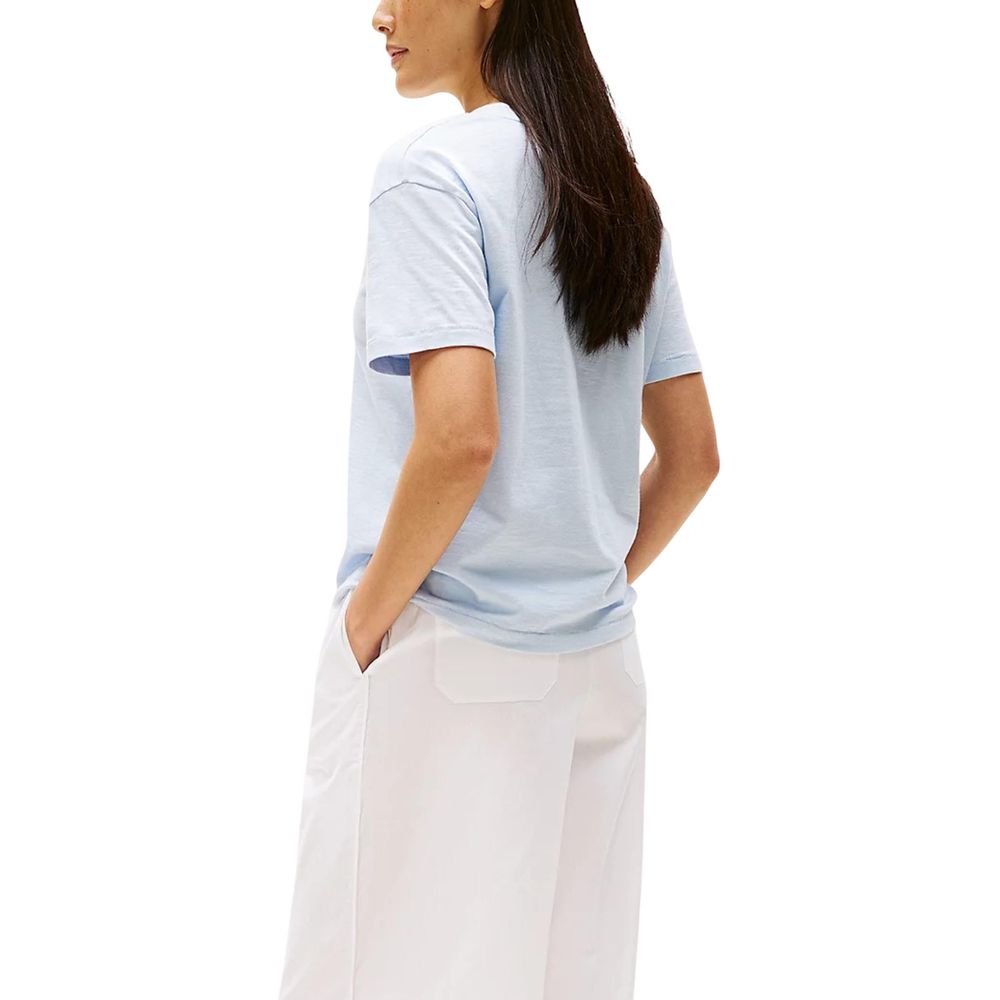 Tommy Hilfiger blue organic cotton T-shirt displayed flat, showcasing a classic crew neck and soft fabric texture.
