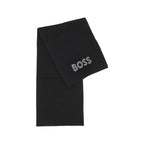 Hugo Boss black polyacrylic scarf with a soft knit texture, styled for a casual winter look.