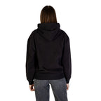 Black cotton hoodie from Calvin Klein Jeans with logo detail, casual fit, and drawstring hood, displayed on a plain background.