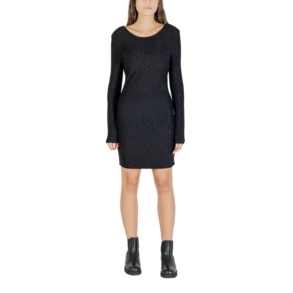 Black polyester short dress by Jacqueline De Yong, featuring a stylish design and fitted silhouette, shown on a model.