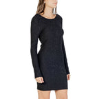 Black polyester short dress by Jacqueline De Yong, featuring a stylish fit and casual design, shown on a model.