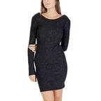 Black polyester short dress by Jacqueline De Yong, shown on a model with a fitted silhouette and stylish design.