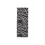 Blue Pieces recycled polyester scarf laid flat, showcasing soft fabric and stylish design for sustainable fashion accessorizing.