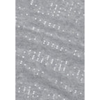 Gray Pieces recycled polyester scarf with a soft, lightweight fabric and subtle texture, styled casually on a model.