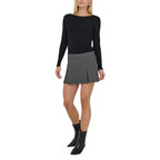 Gray polyester shorts by Jacqueline De Yong, featuring a casual fit and comfortable waistband, shown on a model.