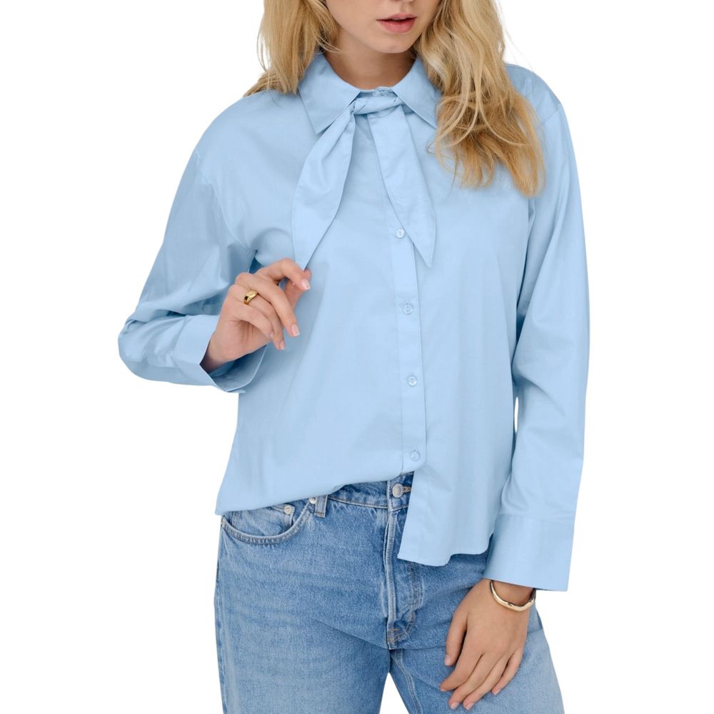 Jacqueline De Yong blue cotton blouse with long sleeves and button front, displayed on a hanger against a plain background.