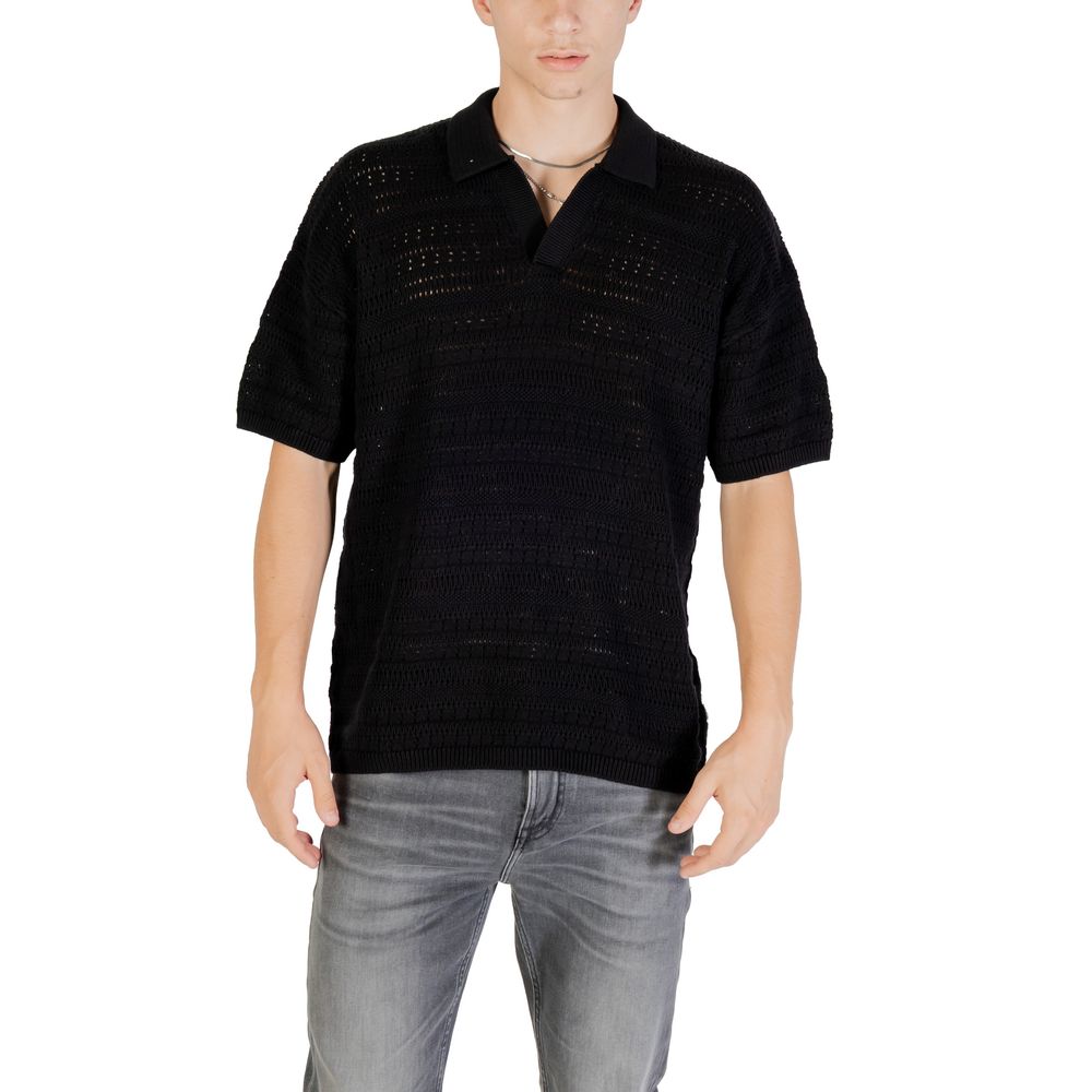 Black cotton polo shirt from Only & Sons with a classic collar and short sleeves, displayed on a plain background.