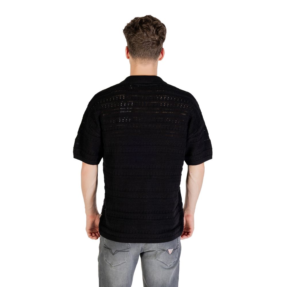 Black cotton polo shirt by Only & Sons, featuring a classic collar and short sleeves, displayed on a neutral background.