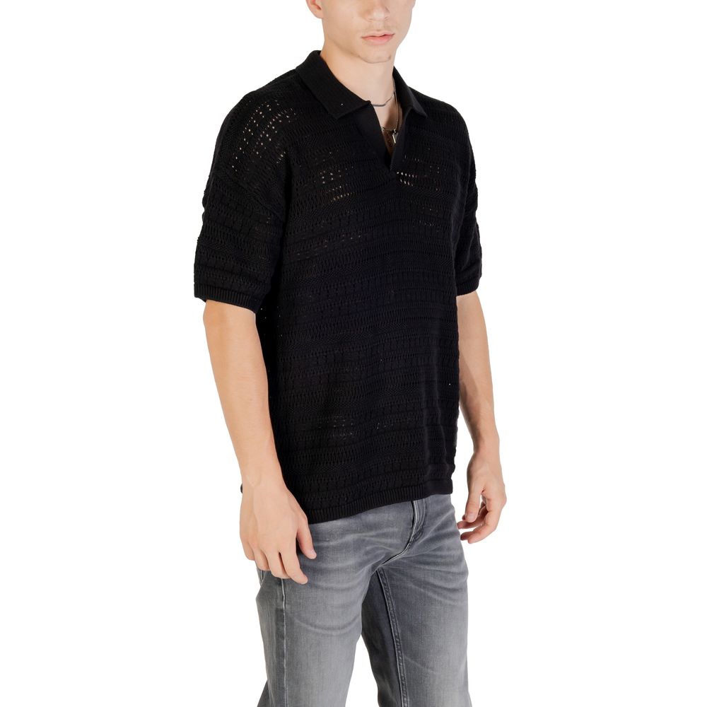 Black cotton polo shirt from Only & Sons, featuring a classic collar and short sleeves, displayed on a plain background.