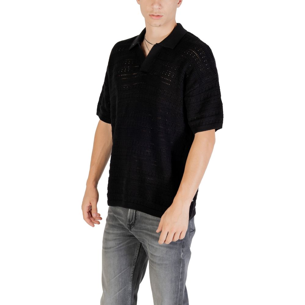 Black cotton polo shirt by Only & Sons, featuring a classic collar and short sleeves, displayed on a neutral background.
