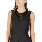 Black Rinascimento polyester jumpsuit with wide-leg pants and sleeveless design, displayed on a mannequin.