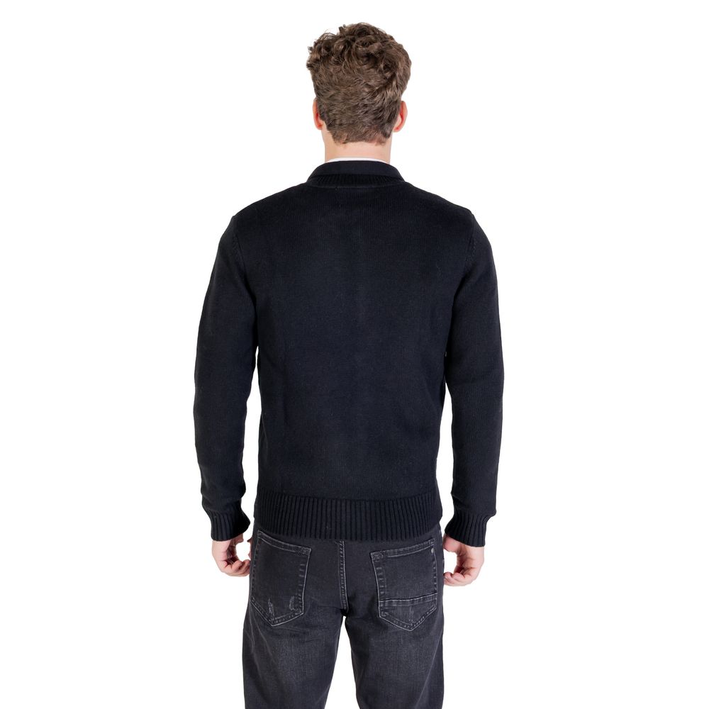 Black Gianni Lupo Marabou Sweatshirt with soft feather-like texture and relaxed fit, shown on a model.