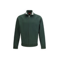 Gucci bicolor polyamide shell jacket with front zipper and adjustable hood, featuring logo details and lightweight design.