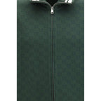 Gucci bicolor polyamide shell jacket with front zipper and adjustable hood, lightweight outdoor outerwear.