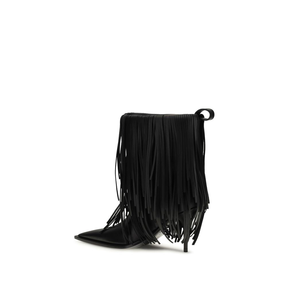 Black calf leather Balenciaga Bos Taurus ankle boots with sleek design and pointed toes, stylish footwear for modern fashion.