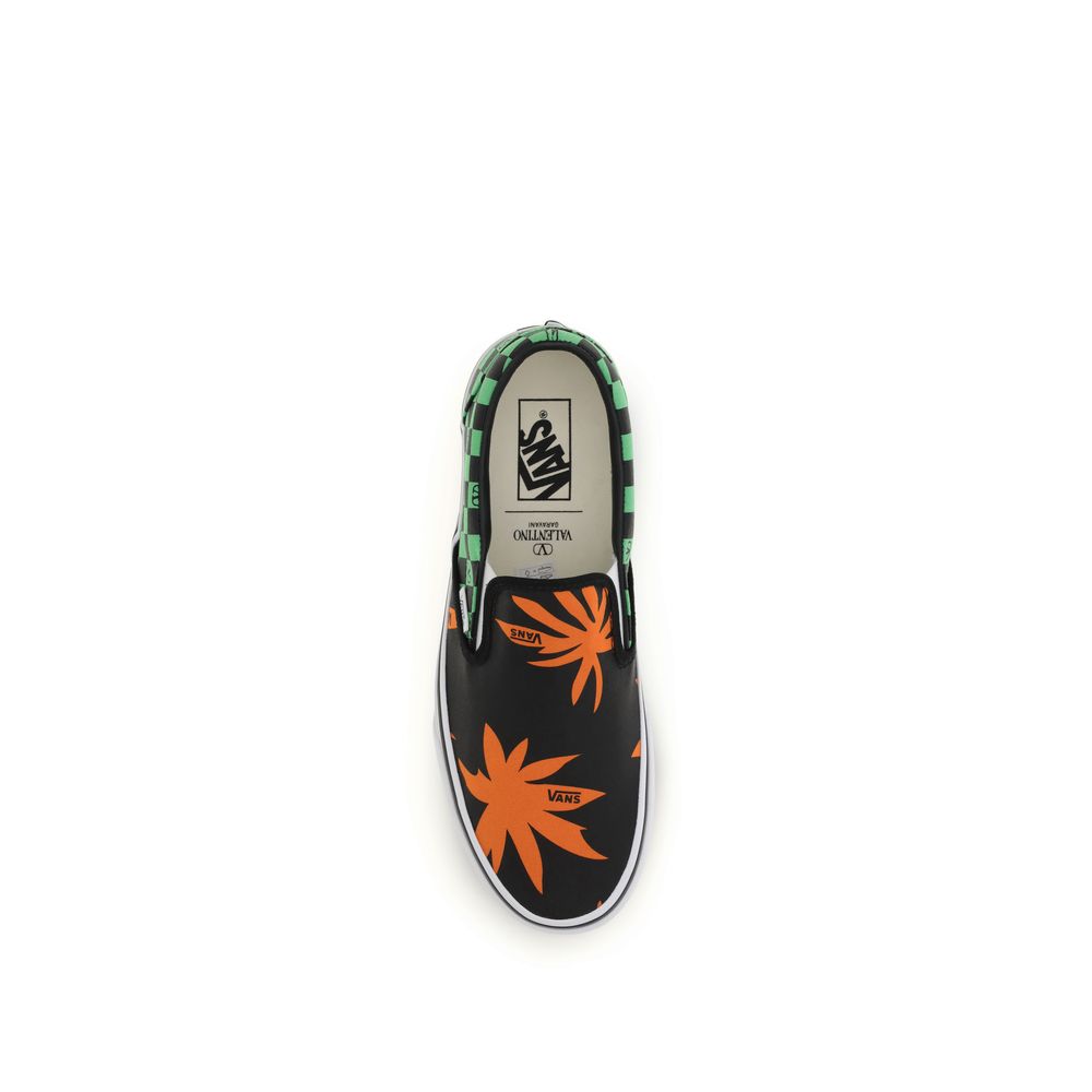 Valentino Garavani multicolor cotton low top sneakers with white soles and vibrant, patterned design.