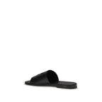 Dolce & Gabbana black calf leather Bos Taurus sandals with open toe and ankle strap, stylish footwear for women.