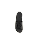 Dolce & Gabbana black calf leather Bos Taurus sandals with open toe and ankle strap, stylish and luxurious footwear.