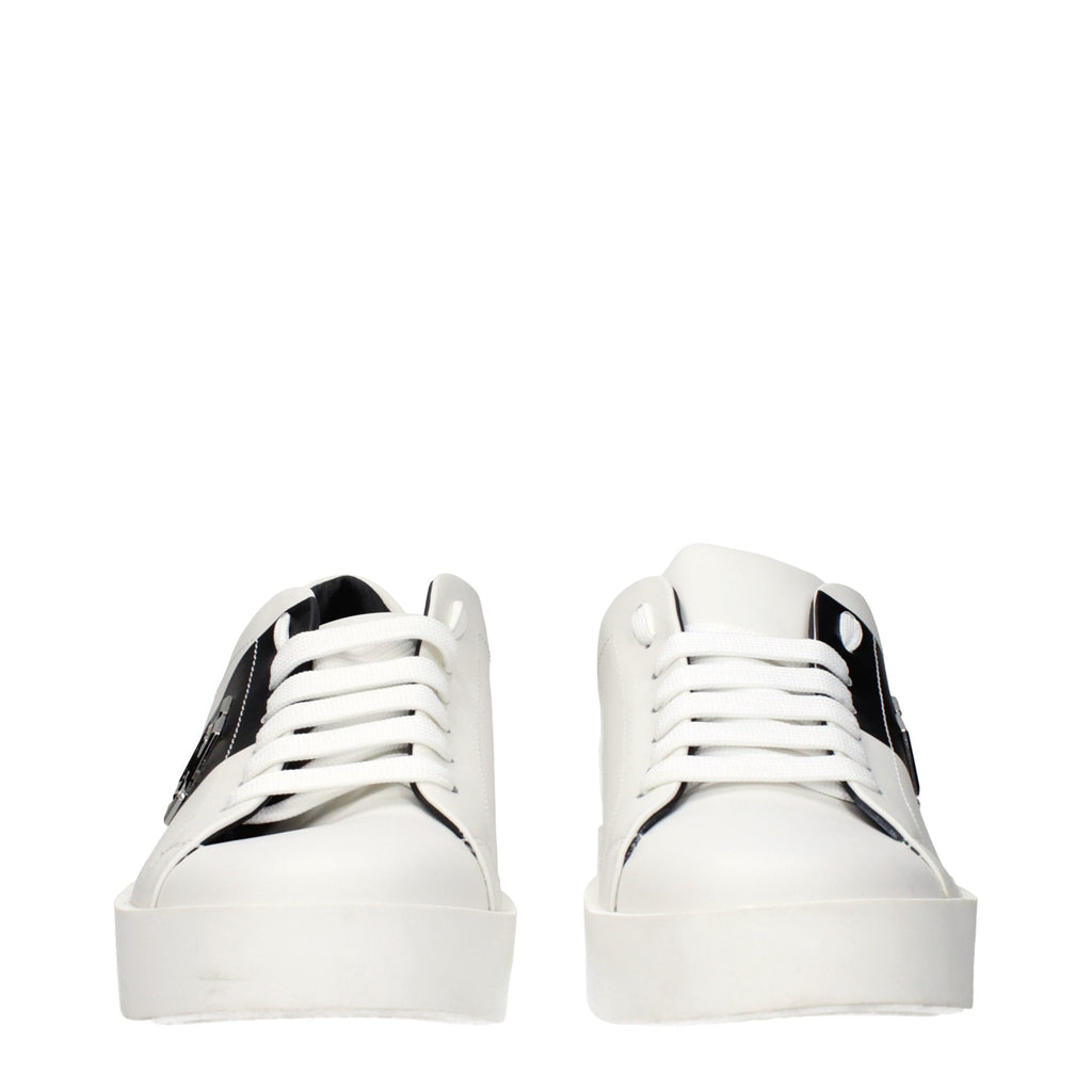 White leather sneakers by Philipp Plein featuring stylish design and branding, with laces and a sleek sole.