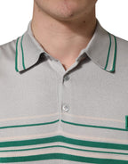 Dolce & Gabbana gray and green striped logo silk polo T-shirt shown on a hanger, featuring a classic collar and short sleeves.