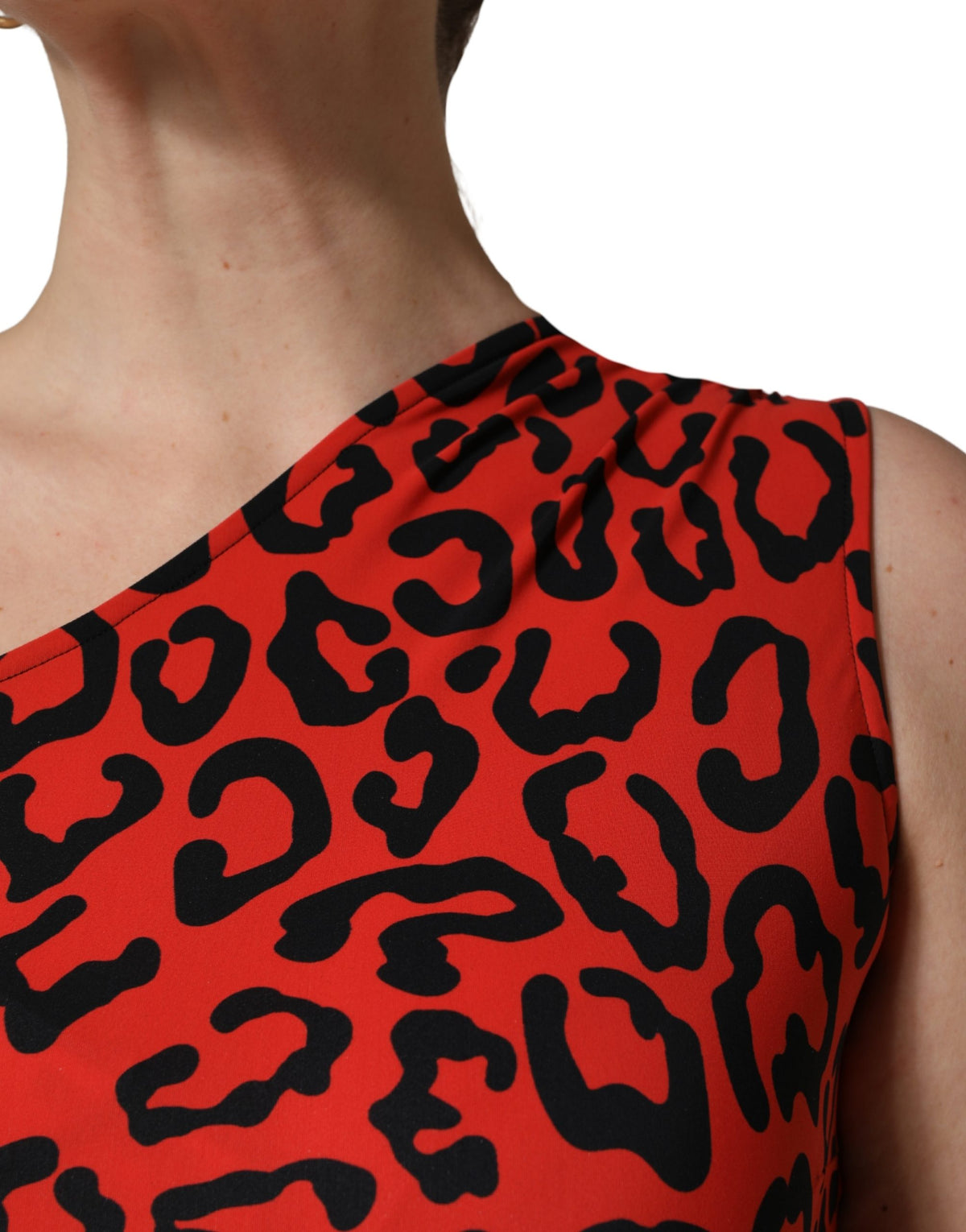 Dolce & Gabbana black and red nylon leopard print jumpsuit with long sleeves and fitted silhouette.