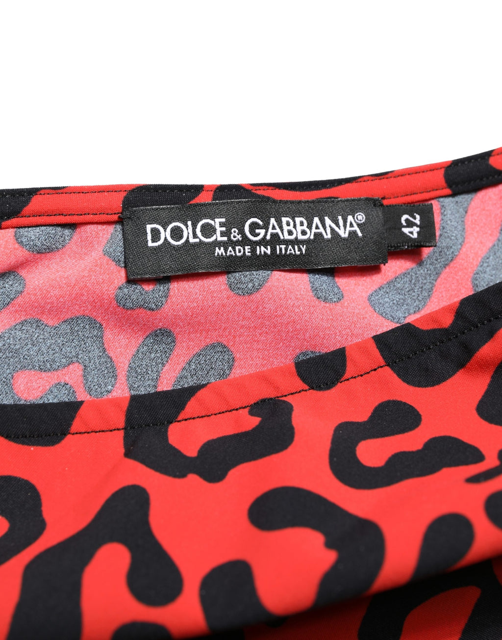 Dolce & Gabbana black and red nylon leopard pattern jumpsuit with long sleeves and fitted silhouette.