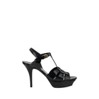 Saint Laurent black calf leather Bos Taurus stiletto heel sandals with ankle straps, showcasing sleek, high-fashion footwear.