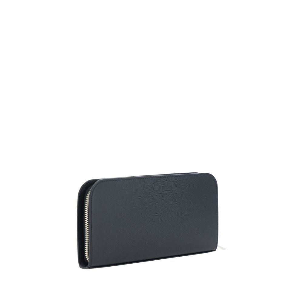 Saint Laurent Bos Taurus wallet in black calf leather, featuring sleek design and Saint Laurent branding.