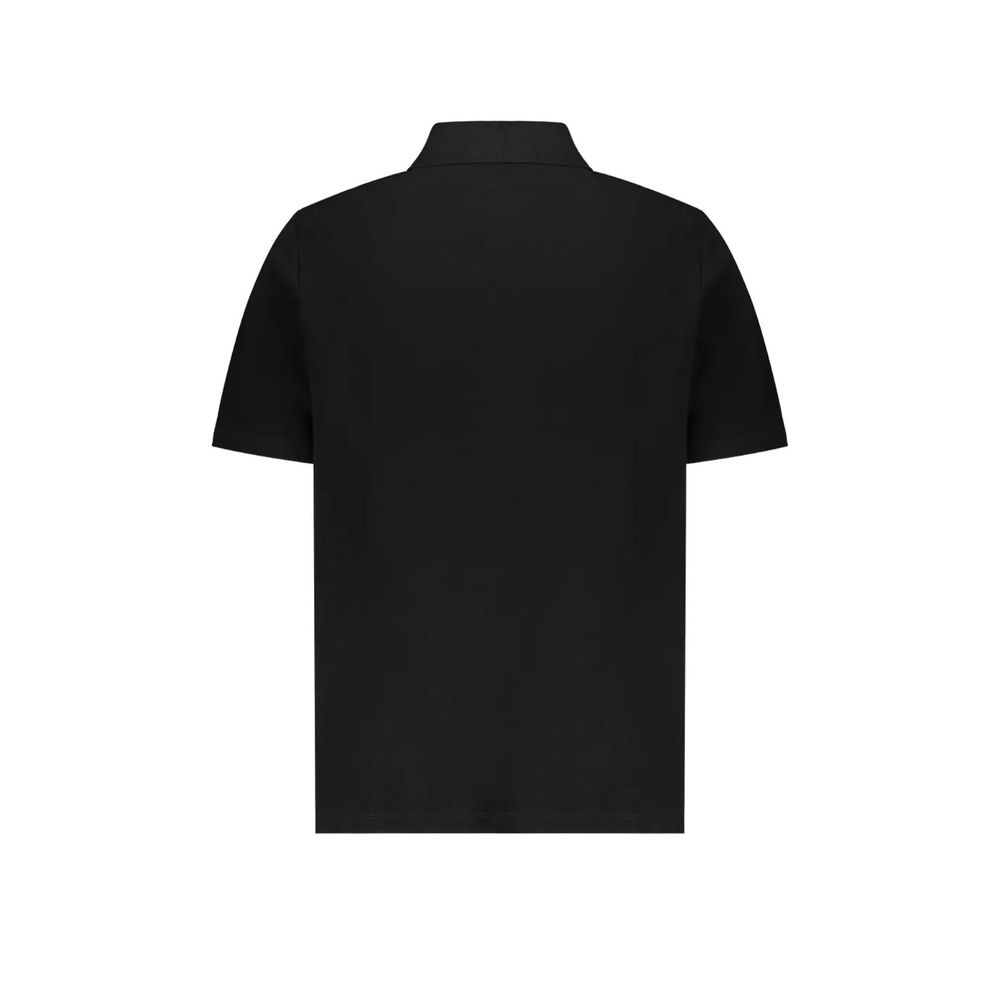 Black cotton polo shirt by Balmain featuring a classic collar and short sleeves, shown on a plain background.