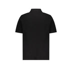Black cotton polo shirt by Balmain featuring a classic collar and short sleeves, shown on a plain background.