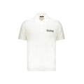 White cotton polo shirt by Balmain, featuring a classic collar and short sleeves, displayed on a neutral background.