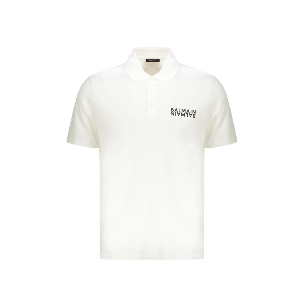 White cotton polo shirt by Balmain, featuring a classic collar and short sleeves, displayed on a neutral background.