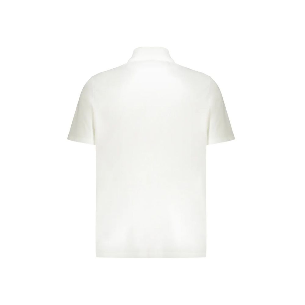 Balmain white cotton polo shirt with a classic collar and short sleeves, displayed on a hanger against a neutral background.
