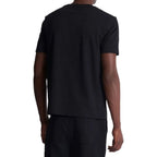 Balmain black cotton T-shirt with short sleeves and crew neck, featuring subtle branding and a sleek, minimalist design.