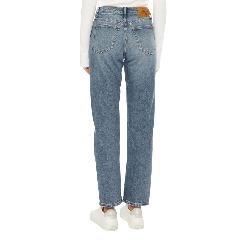 Blue cotton skinny jeans from Calvin Klein Jeans, close-up of fitted denim pants with classic stitching and five-pocket design.