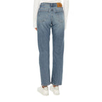 Blue cotton skinny jeans from Calvin Klein Jeans, close-up of fitted denim pants with classic stitching and five-pocket design.