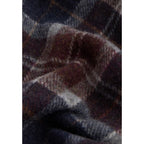 Barbour bicolor wool scarf featuring a striped pattern and fringed ends, perfect for cozy winter wear.