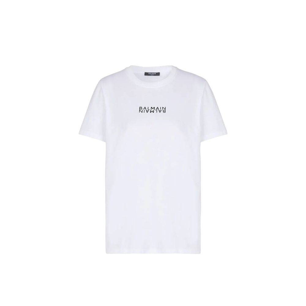 White cotton T-shirt by Balmain featuring a classic fit and subtle branding, shown laid flat on a neutral background.