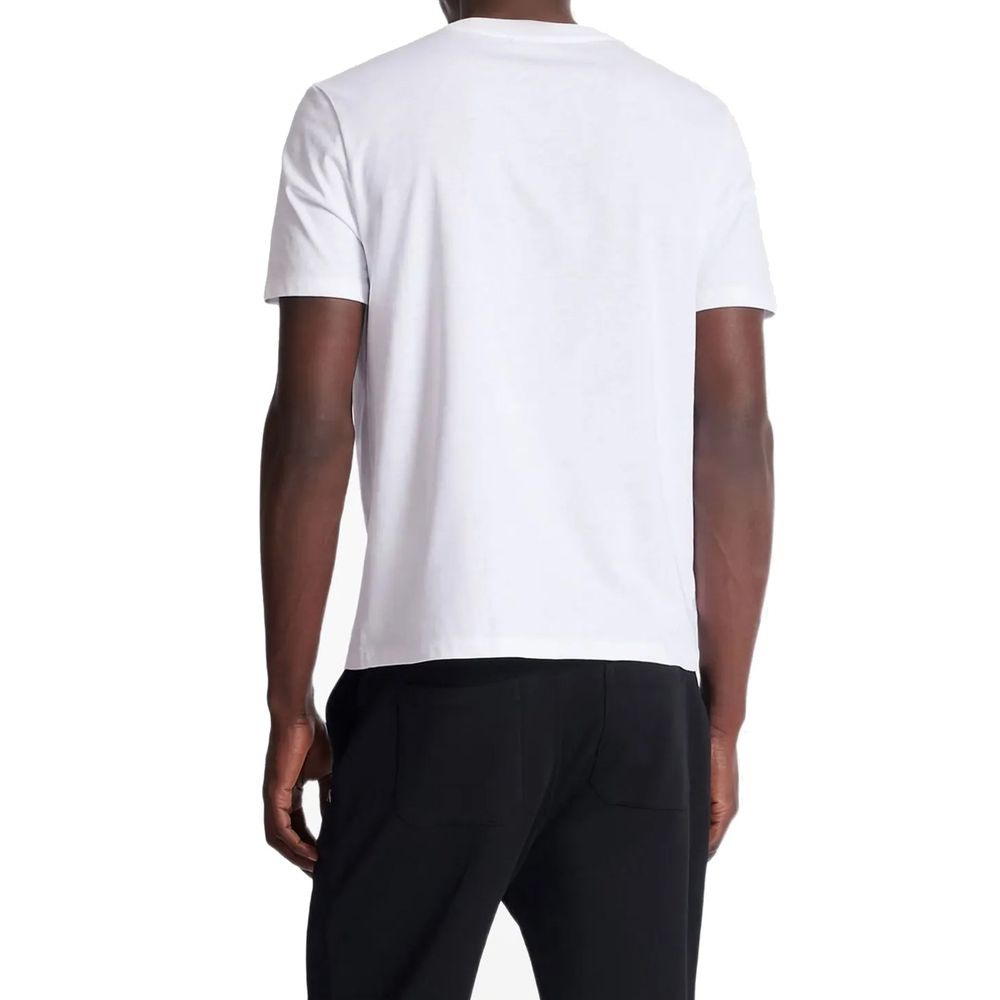 Balmain white cotton T-shirt with crew neck and short sleeves, featuring subtle branding details.