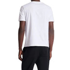 Balmain white cotton T-shirt with crew neck and short sleeves, featuring subtle branding details.