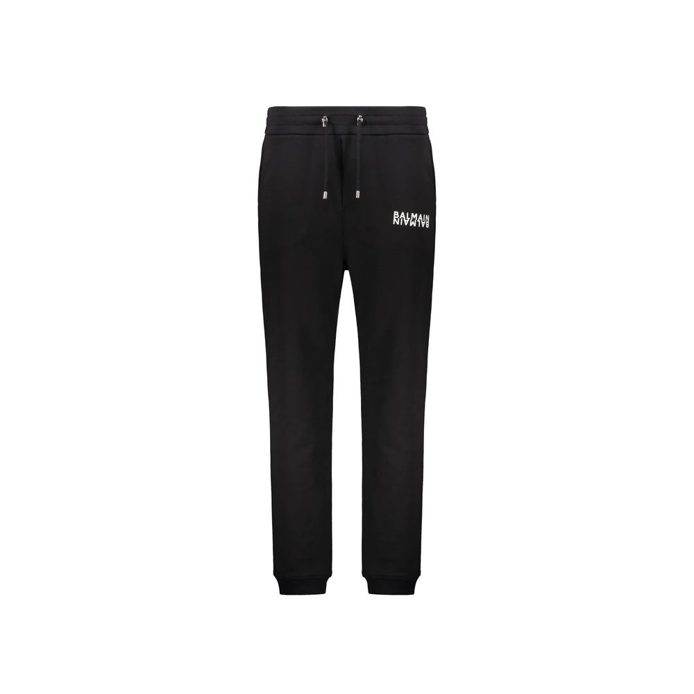 Balmain black cotton joggers, casual workout pants with elastic waistband and tapered fit, suitable for athletic and everyday wear.