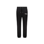 Balmain black cotton joggers, casual workout pants with elastic waistband and tapered fit, suitable for athletic and everyday wear.