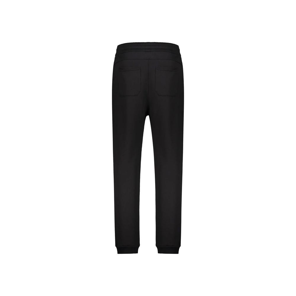 Balmain black cotton joggers, workout pants with a relaxed fit, featuring elastic waistband and side pockets, casual athletic style.