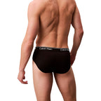 Calvin Klein Underwear black recycled polyester briefs shown on a model, featuring a snug fit and classic waistband for everyday comfort.