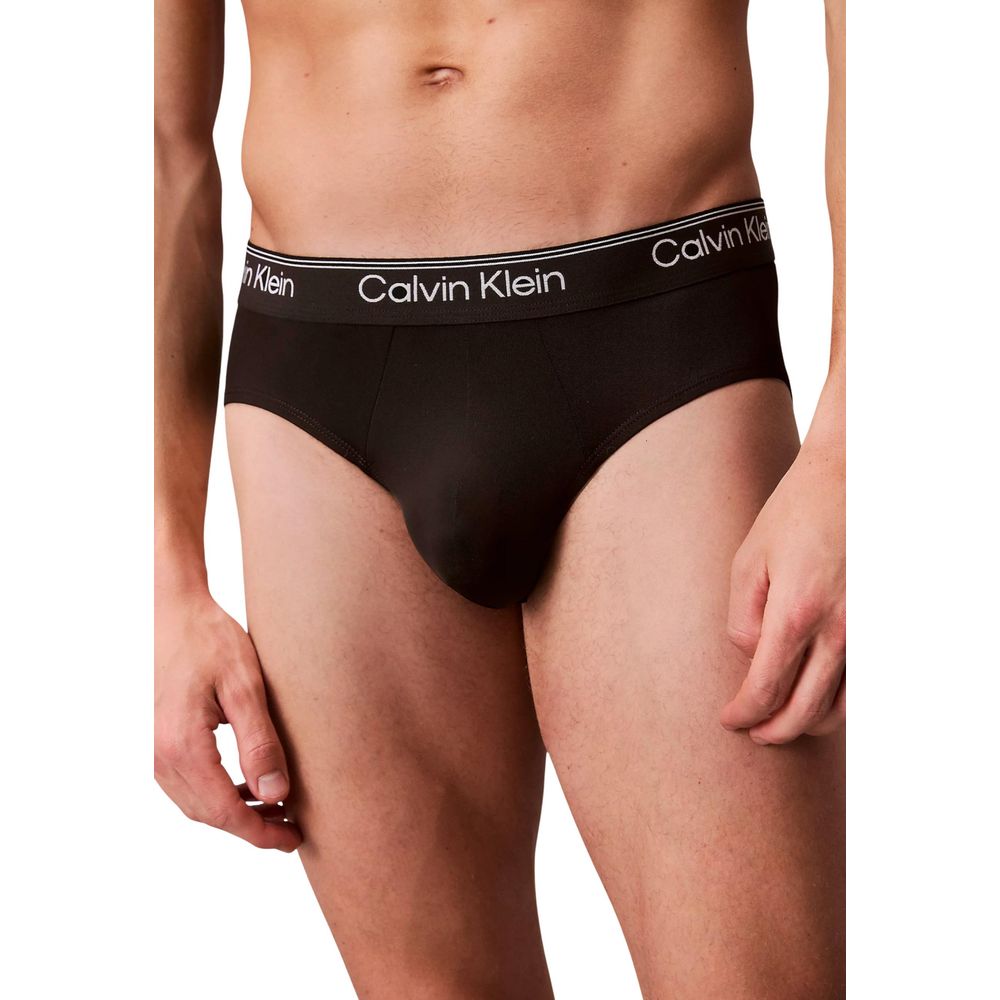 Black Calvin Klein Underwear briefs made from recycled polyester, featuring a comfortable fit and iconic logo waistband.